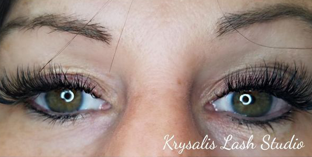Two eyes with long black eyelash extensions in Grand Rapids